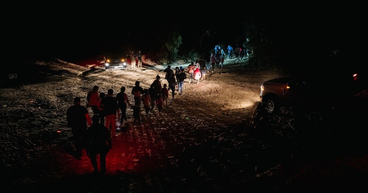 Migrants in Roma, Texas, are seen being taken to a border patrol processing facility on June 19.