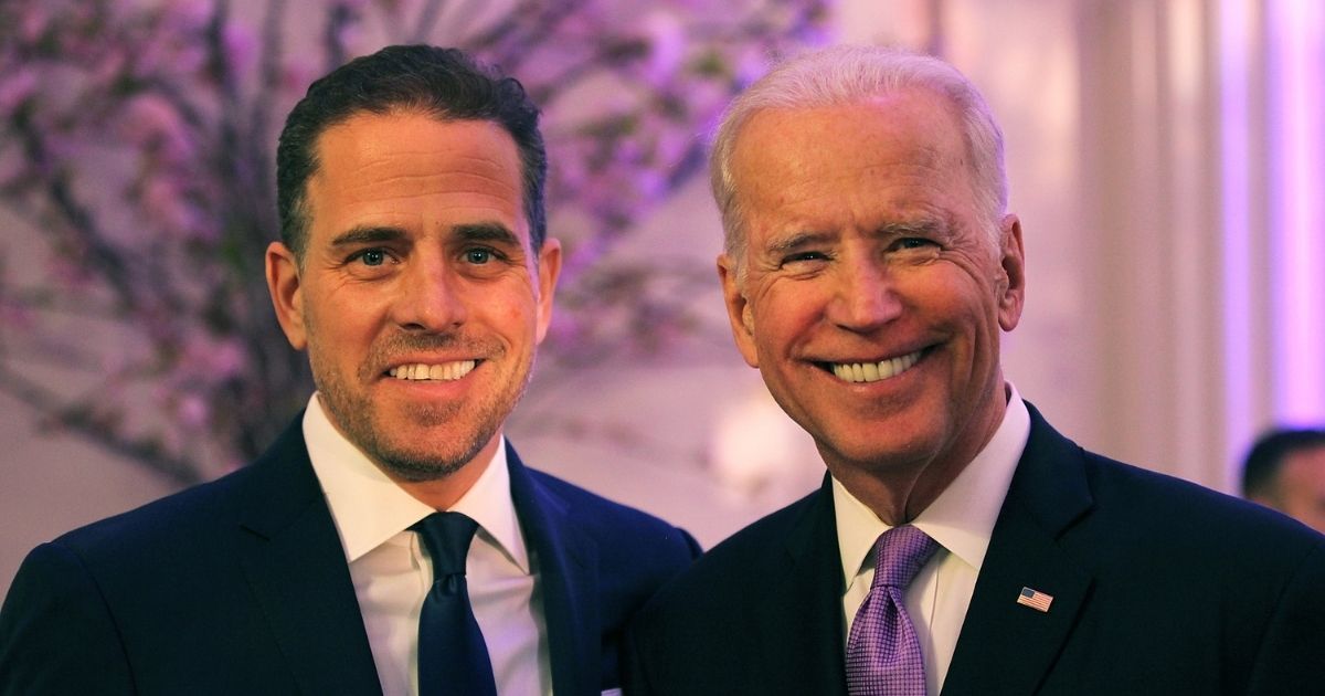 Hunter and Joe Biden attend a World Food Program USA event at the Organization of American States in Washington on April 12, 2016.