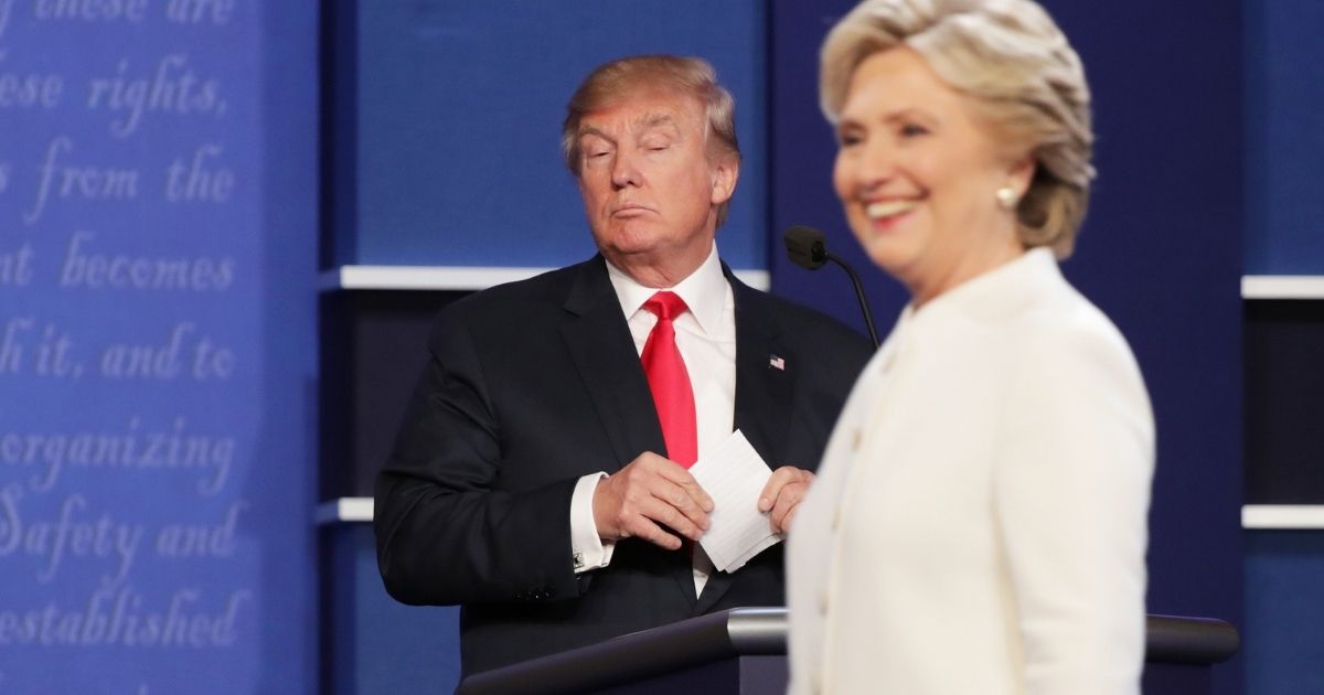 Then-Democratic presidential nominee Hillary Clinton appears on a debate stage on Oct. 19, 2016, with GOP candidate Donald Trump in Las Vegas.