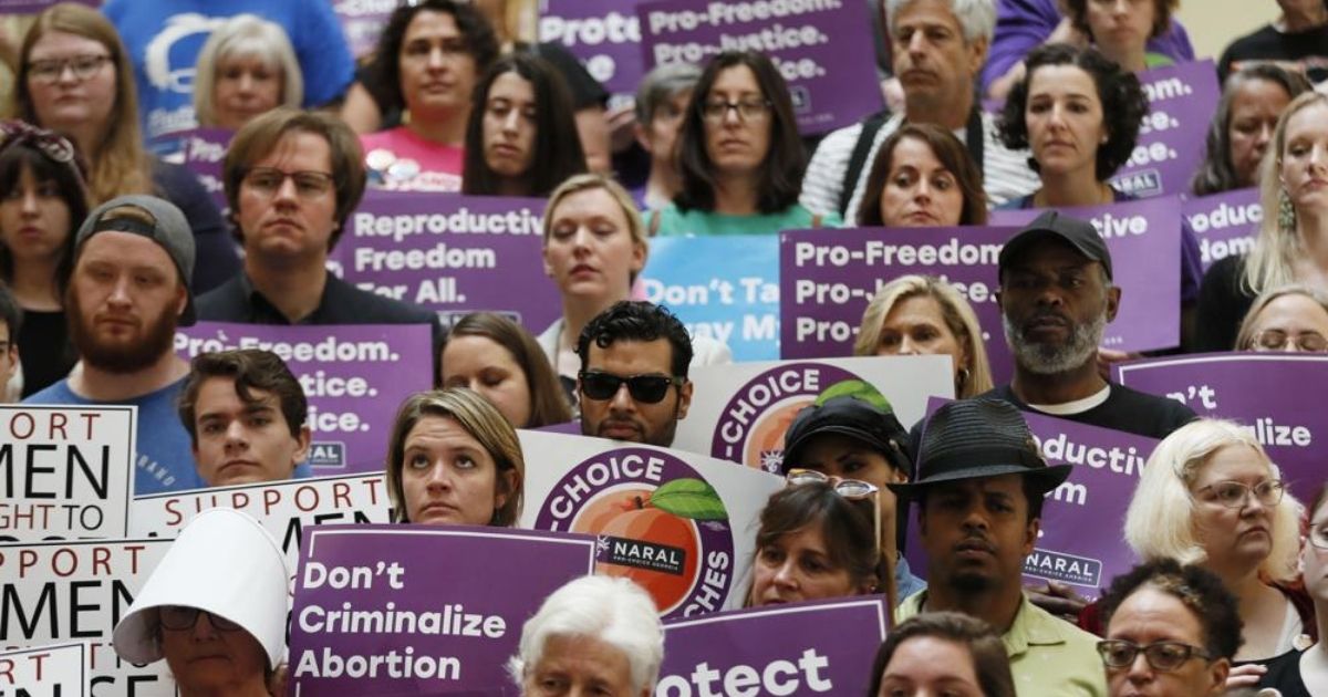 Pro-choice activists are seen at the Georgia State Capitol in Atlanta on Sept. 24.