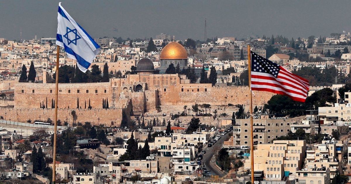 A photo shows the Israeli and US flags standing side by side in East Jerusalem on Dec. 13, 2017.