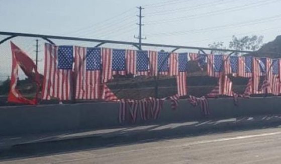 Damaged flags in Riverside, California, are seen on Wednesday.