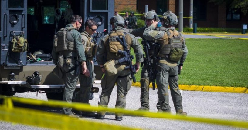 Virginia State Police SWAT Team members are seen outside Heritage High School in Newport News, Virginia, on Monday.