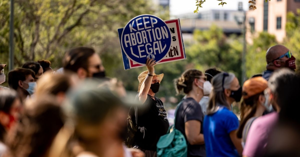Abortion activists are seen outside the Texas State Capitol in Austin, Texas, on Sept. 11, 2021.