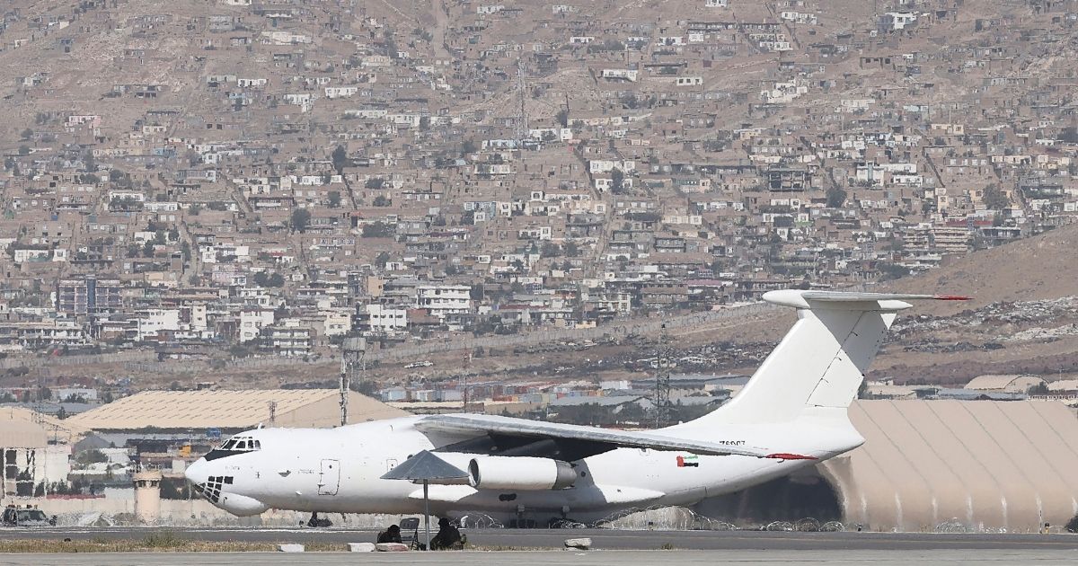 A plane coming from the United Arab Emirates carrying medical aid arrives at the airport in Kabul on Sept. 15, 2021.
