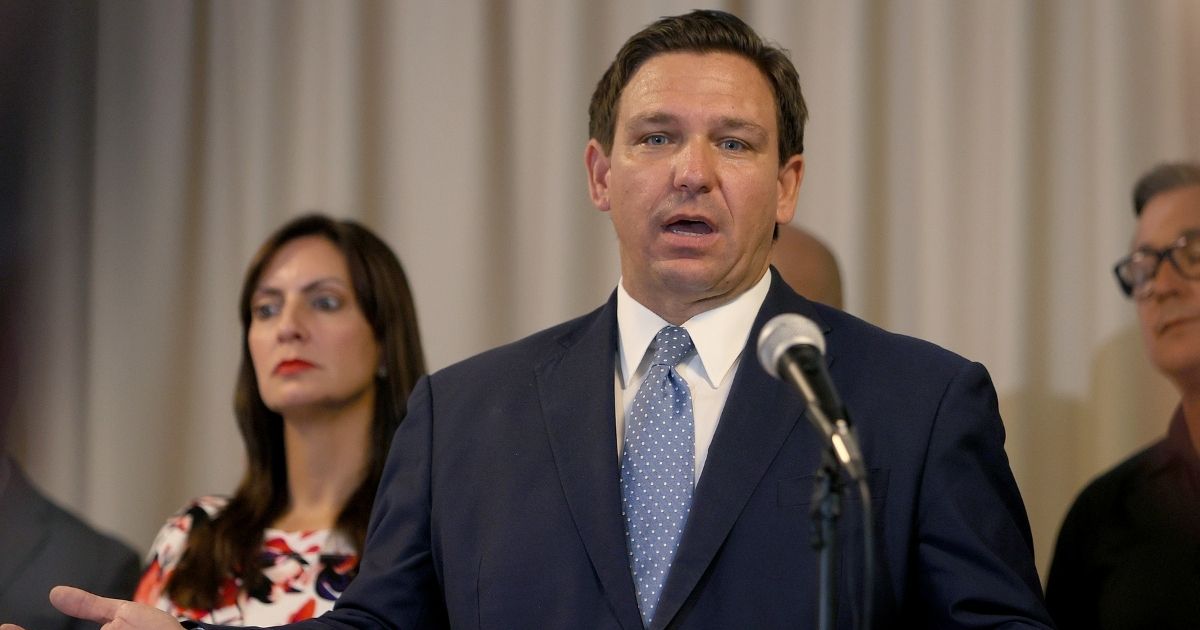 Florida Republican Gov. Ron DeSantis speaks during an event to give out bonuses to first responders held at the Grand Beach Hotel Surfside on Aug. 10, in Surfside, Florida.