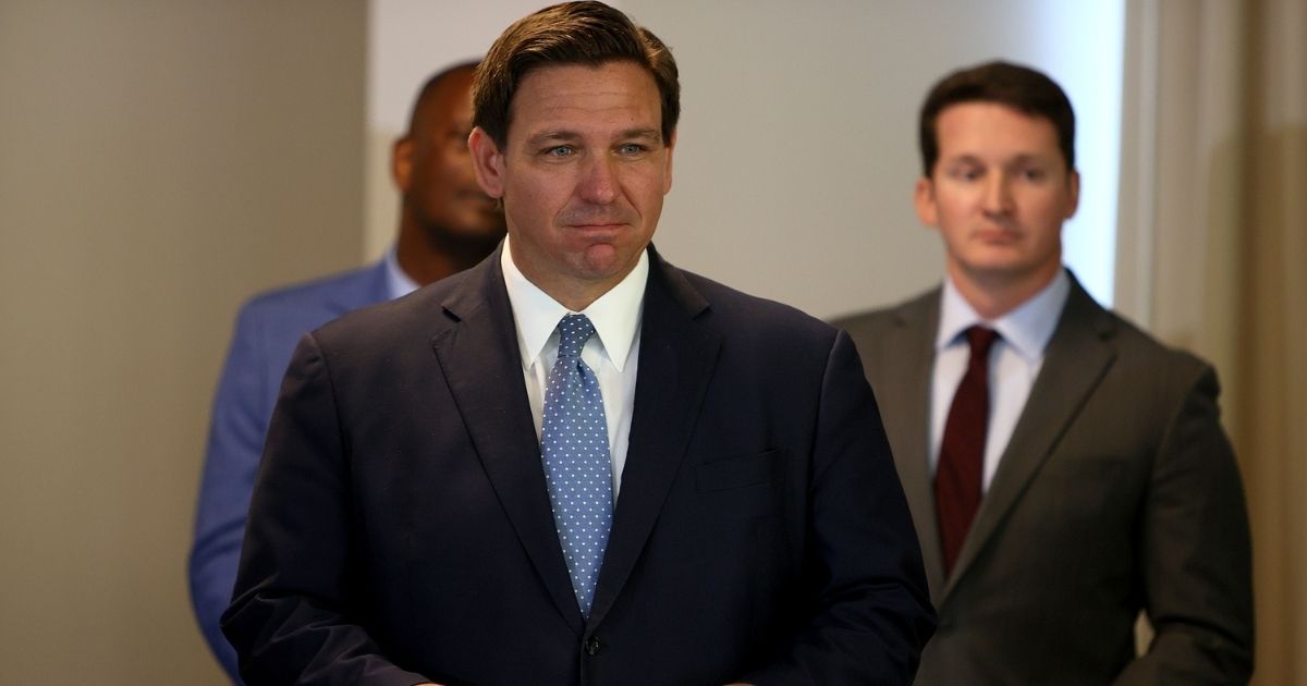 Florida Gov. Ron DeSantis is seen at the Grand Beach Hotel in Surfside on Aug. 10.