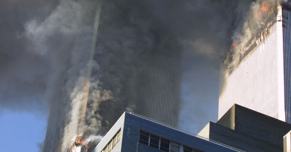 The twin towers of the World Trade Center burn on Sept. 11, 2001.
