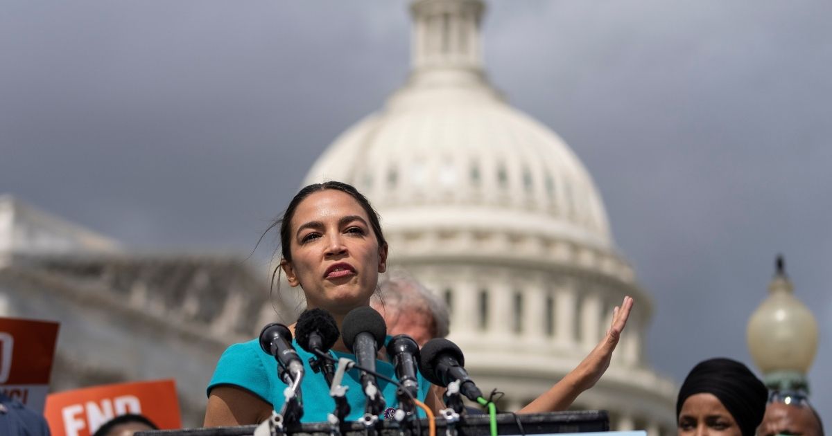 New York Democrat Rep. Alexandria Ocasio-Cortez, seen speaking at the Capitol Sept. 21, is using some creative math in claiming that the Jan. 6 incursion claimed 'almost 10' lives.