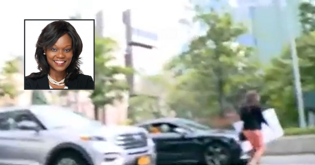 New York state Assemblywoman Rodneyse Bichotte Hermelyn, inset, walks into traffic to avoid NY1 reporter Courtney Gross.