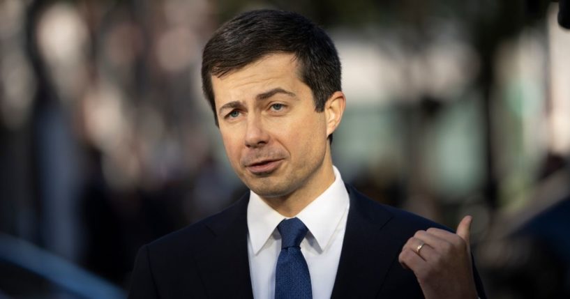 Secretary of Transportation Pete Buttigieg speaks during an event outside of the Department of Transportation on Wednesday in Washington, D.C.