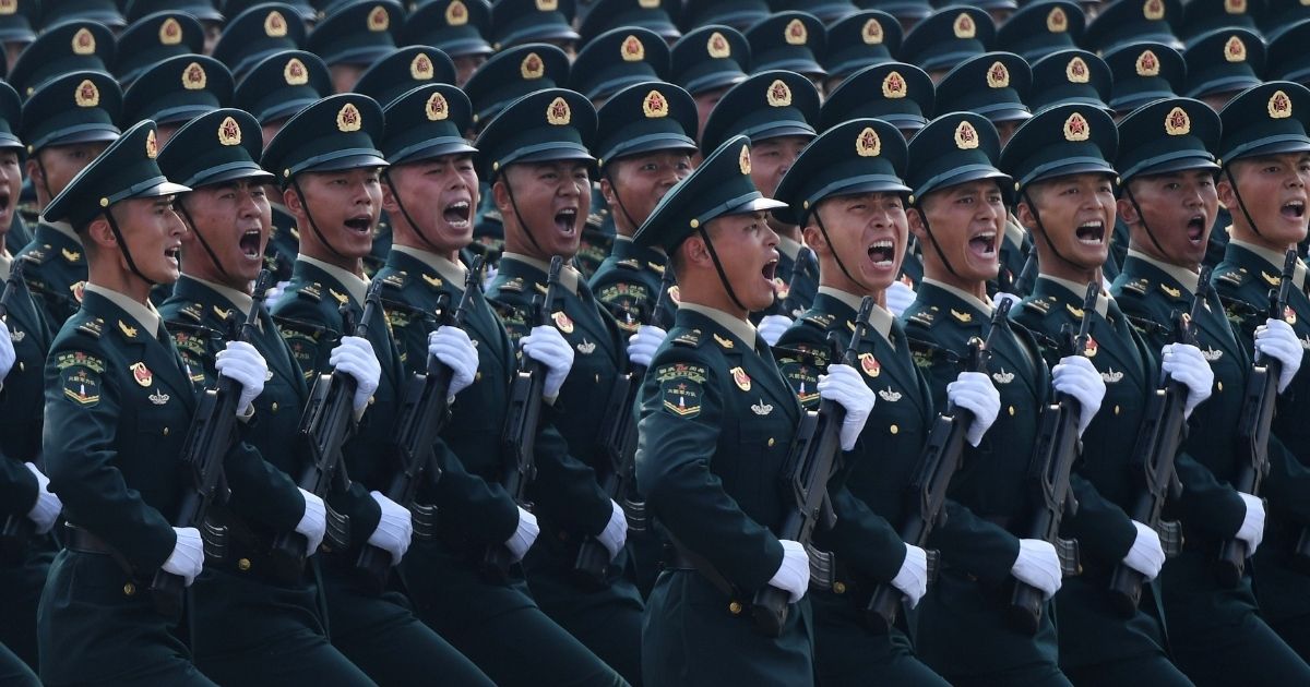 Chinese troops march in a military parade in Tiananmen Square in Beijing on Oct. 1, 2019.