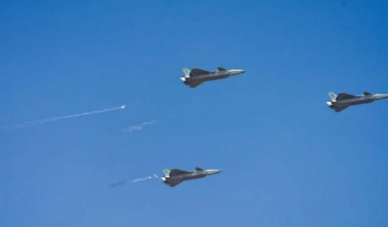 A fleet of J-20 fighter jets cruise during a joint Chinese-Russian military exercise at a training base in Qingtongxia City in northwest China's Ningxia Hui Autonomous Region on Aug. 9-13.