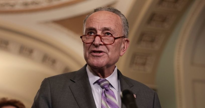 Senate Majority Leader Chuck Schumer addresses reporters following a weekly Democratic policy luncheon on Oct. 5, 2021, in Washington, D.C.