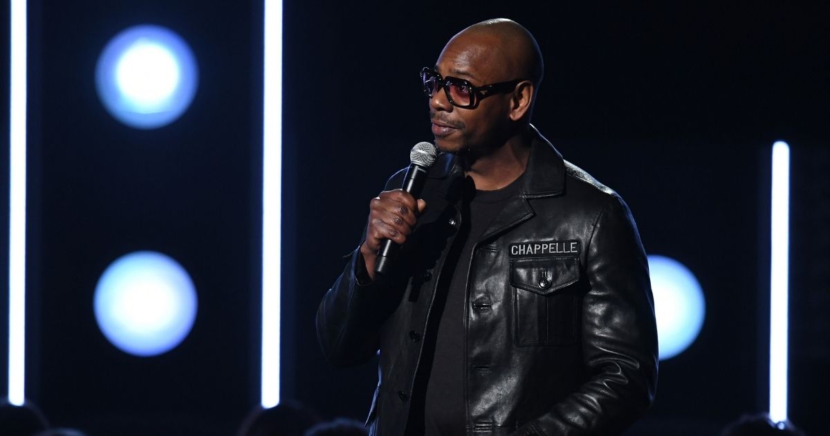 Comedian Dave Chappelle speaks onstage during the Grammy Awards at Madison Square Garden on Jan. 28, 2018, in New York City.