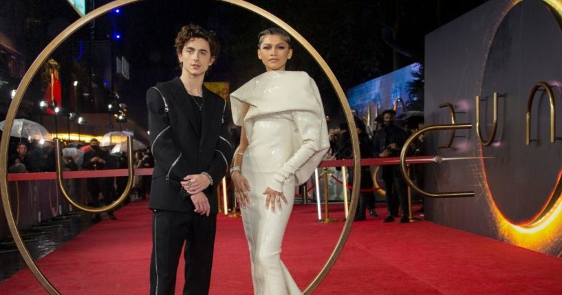 Zendaya, right, and Timothee Chalamet pose for photographers upon arrival at the premiere of the film 'Dune' on Oct. 18 in London.