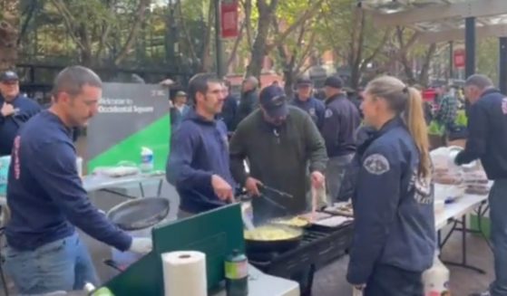 Firefighters and first responders in Seattle who were reportedly fired following noncompliance with a vaccine mandate serve the homeless.