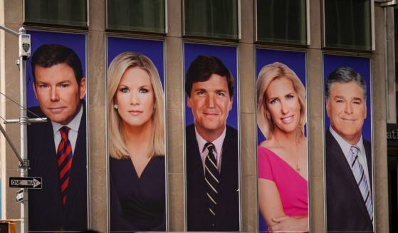 Advertisements featuring Fox News personalities, including Bret Baier, Martha MacCallum, Tucker Carlson, Laura Ingraham and Sean Hannity, adorn the front of the News Corporation building on March 13, 2019 in New York City.