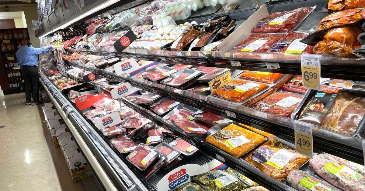 A customer shops for meat at a Safeway store in San Francisco on Monday.