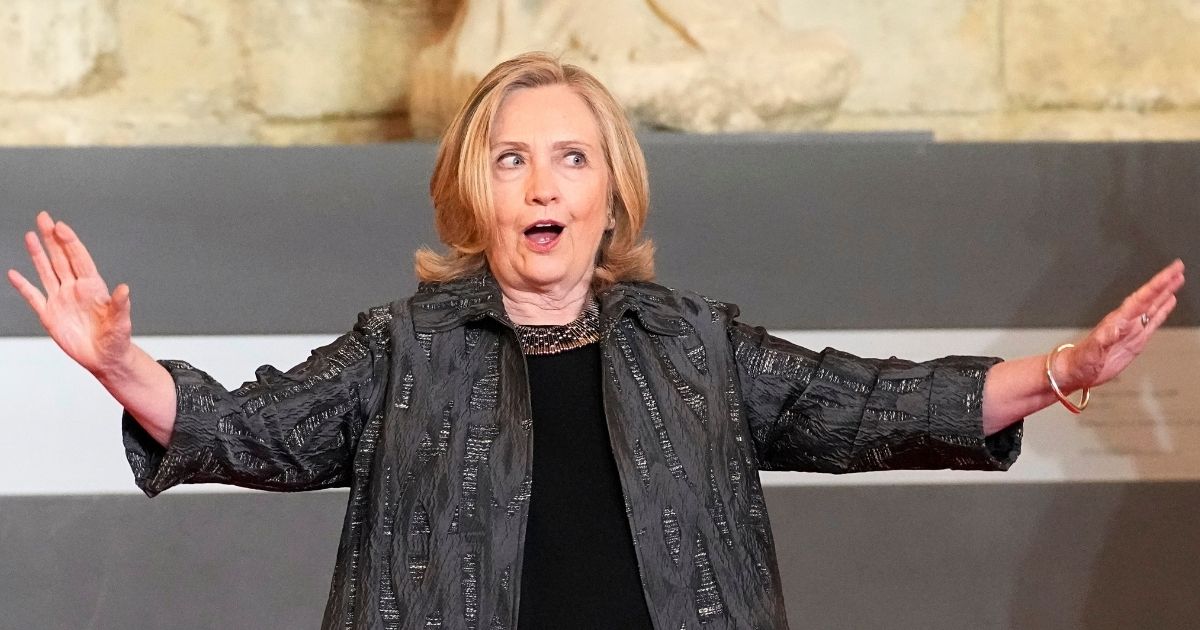 Hillary Clinton attends an international conference to discuss gender equality and allocate funding to women's programs in Paris, France, on June 30.