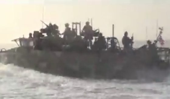 Iranian speedboats are seen in a video posted to Twitter state TV.