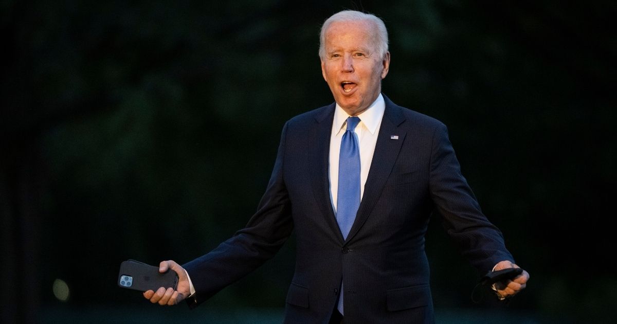 President Joe Biden, seen as he arrived at the White House Friday, has drawn heavy criticism from immigration activists for his administration's attempts to reinstate a Trump-era policy.