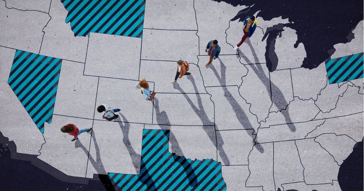 This stock image portrays a group of people walking across a map of the United States. Occupy Democrats, a left-wing group, advocated on Twitter for Democratic voters to move to red states in order to flip them blue.