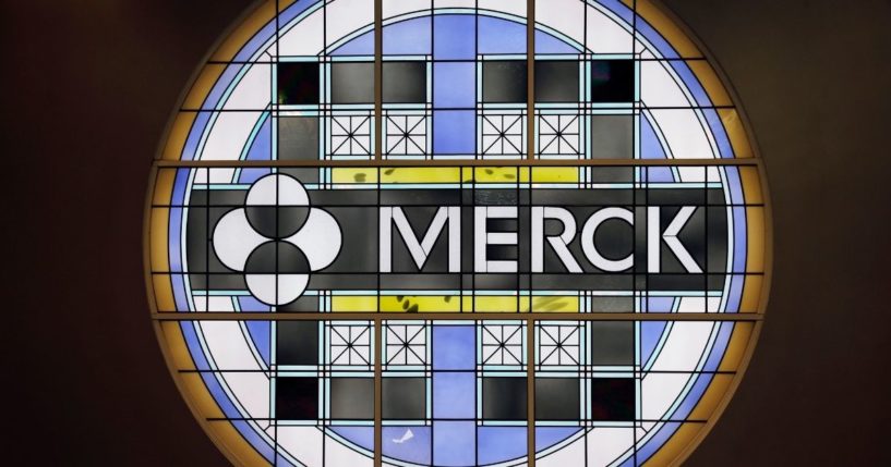 A stained-glass panel of the Merck logo is seen in this file photo from 2014. Merck & Co. has submitted its COVID-19 pill to the FDA for Emergency Use Authorization.