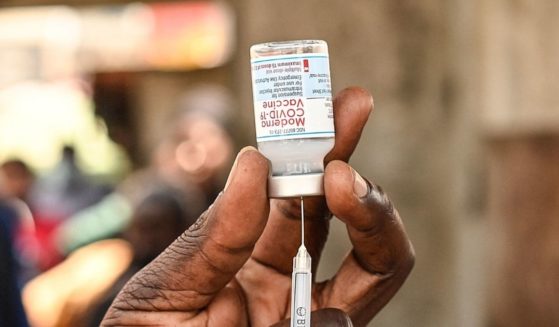 A health official prepares a syringe with the Moderna Covid-19 vaccine prior to administering it during a mass Covid-19 vaccination drive in Nairobi on Sept. 17, 2021.