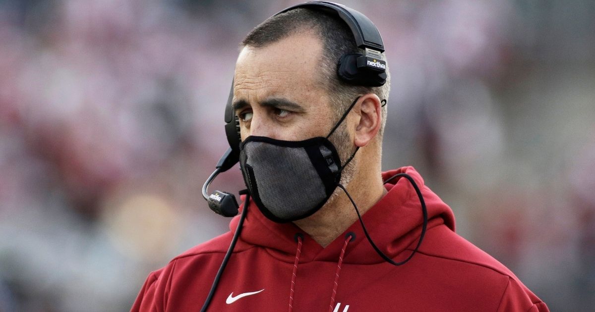 Washington State University football coach Nick Rolovich watches during the first half of an NCAA college football game against Stanford in Pullman, Washington.