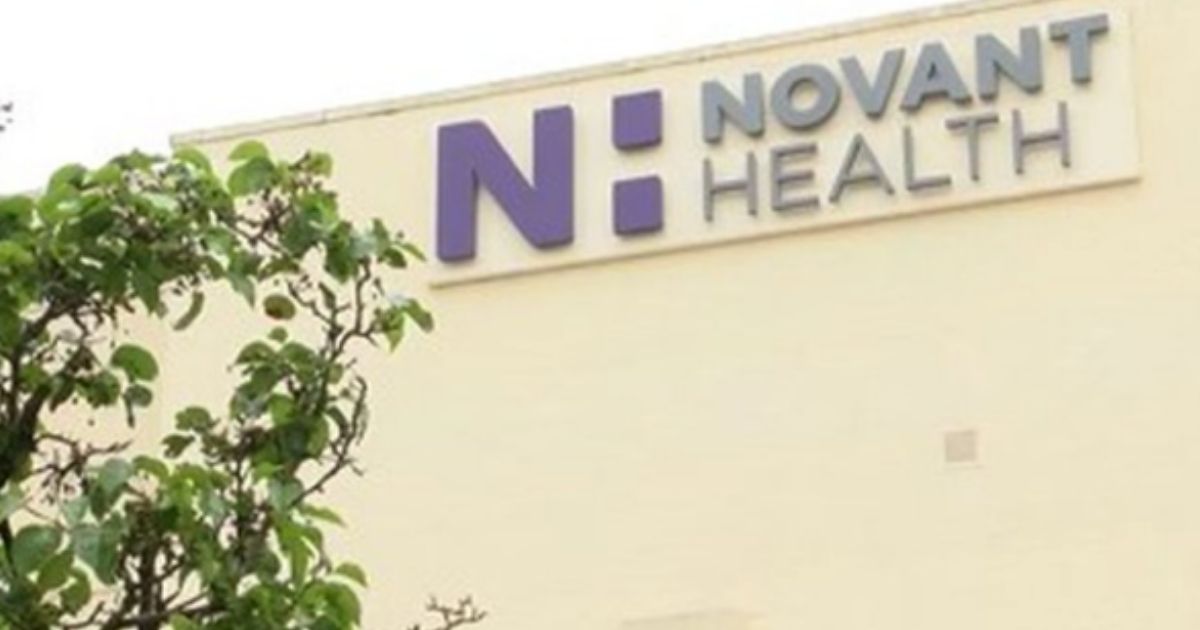 The Novant Health logo is seen on a building