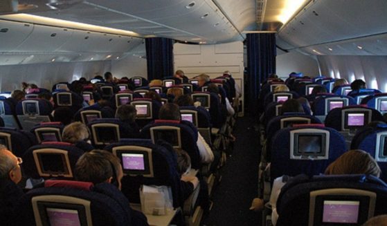 Passengers sir on British Airways Boeing 777-200 G-YMMA on a flight from Montreal Trudeau to London Heathrow.