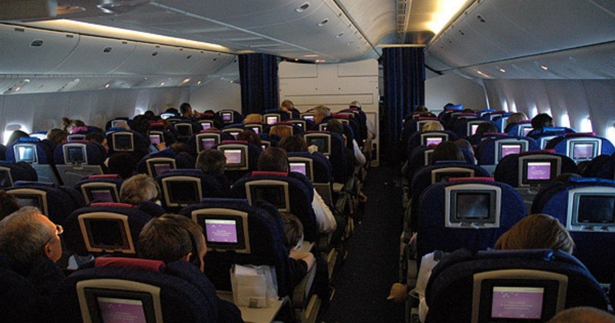 Passengers sir on British Airways Boeing 777-200 G-YMMA on a flight from Montreal Trudeau to London Heathrow.