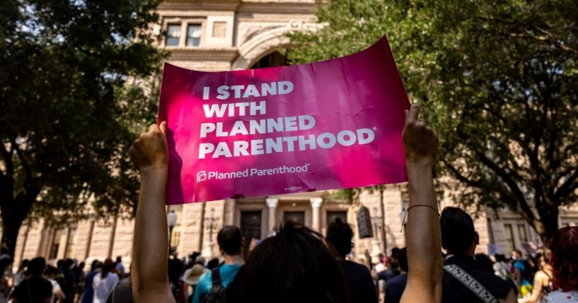 A pro-choice activist holds a sign in support of Planned Parenthood at a rally at the Texas State Capitol on Sept. 11, 2021 in Austin, Texas.