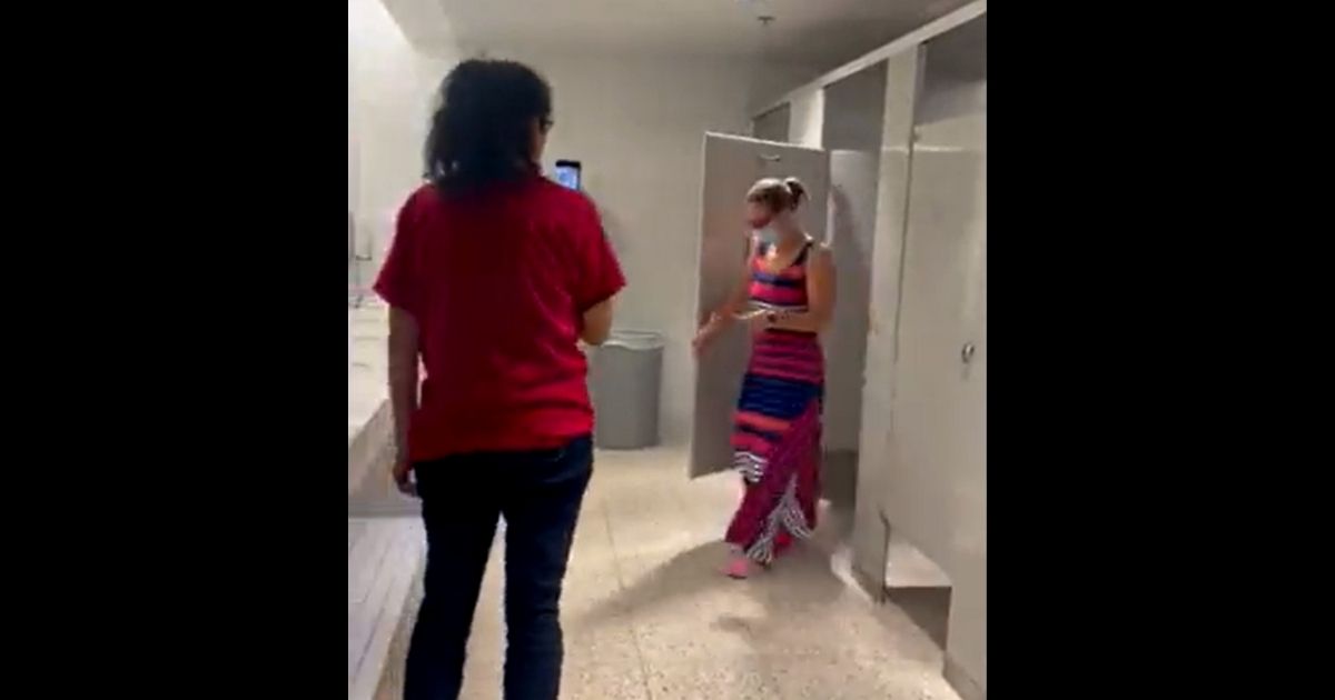 Immigration activists record themselves harassing Democratic Sen. Kyrsten Sinema in a bathroom at Arizona State University's downtown Phoenix campus.