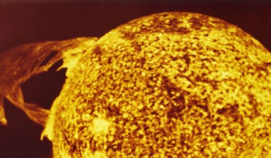 A solar flare is seen on the surface of the sun in this file photo taken from the Skylab space station in 1974. A large solar flare erupted Thursday. Charged particles from the eruption are expected to hit Earth's atmosphere sometime this weekend, causing a boost in the northern lights --- potentially on Halloween.