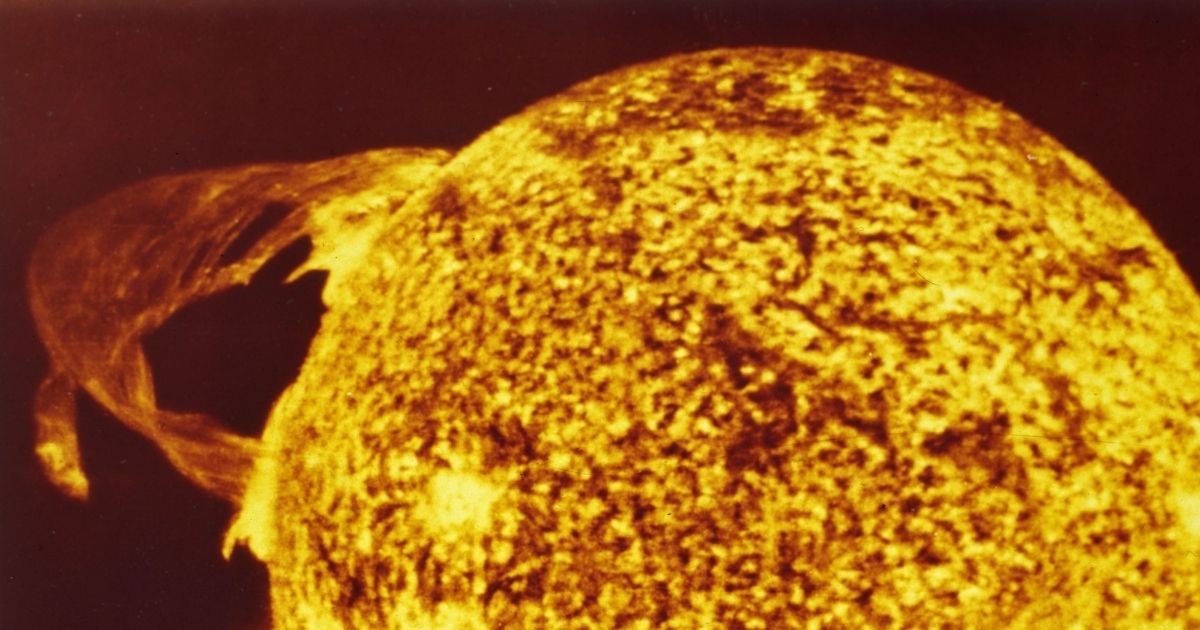 A solar flare is seen on the surface of the sun in this file photo taken from the Skylab space station in 1974. A large solar flare erupted Thursday. Charged particles from the eruption are expected to hit Earth's atmosphere sometime this weekend, causing a boost in the northern lights --- potentially on Halloween.