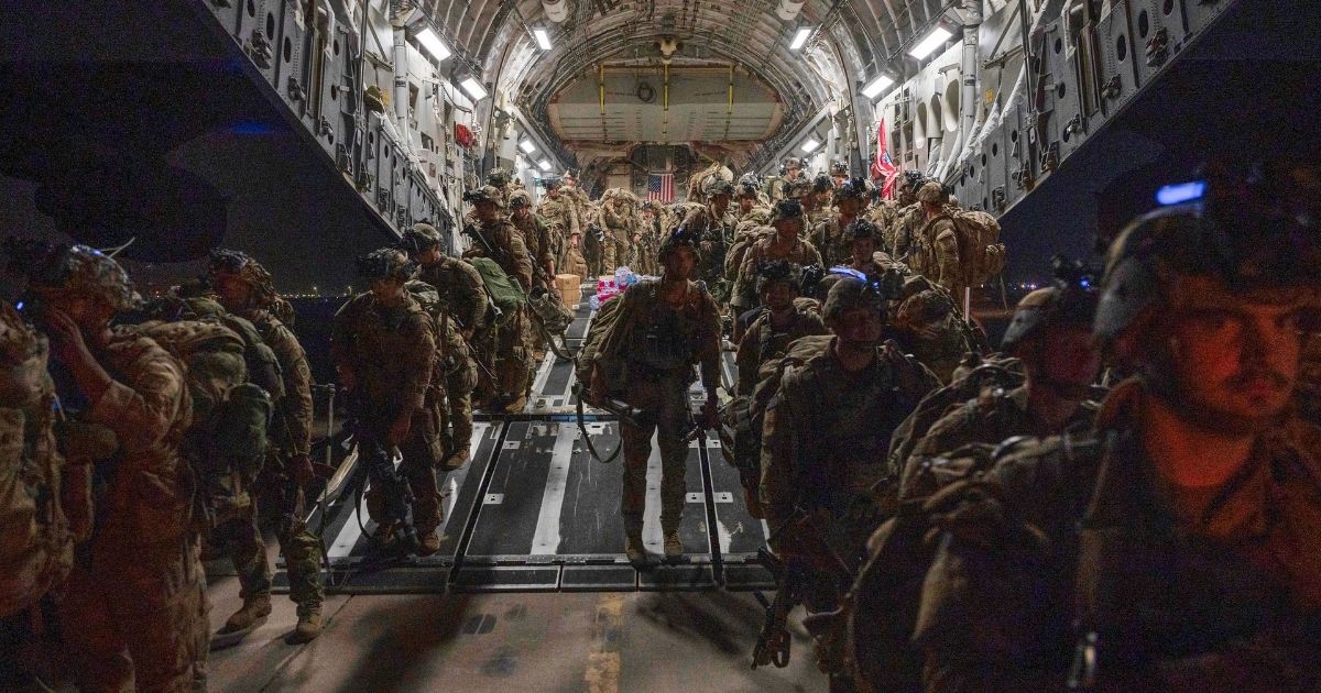 U.S. soldiers deplane at Ali Al Saleem Air Base, Kuwait on Aug. 31, 2021.