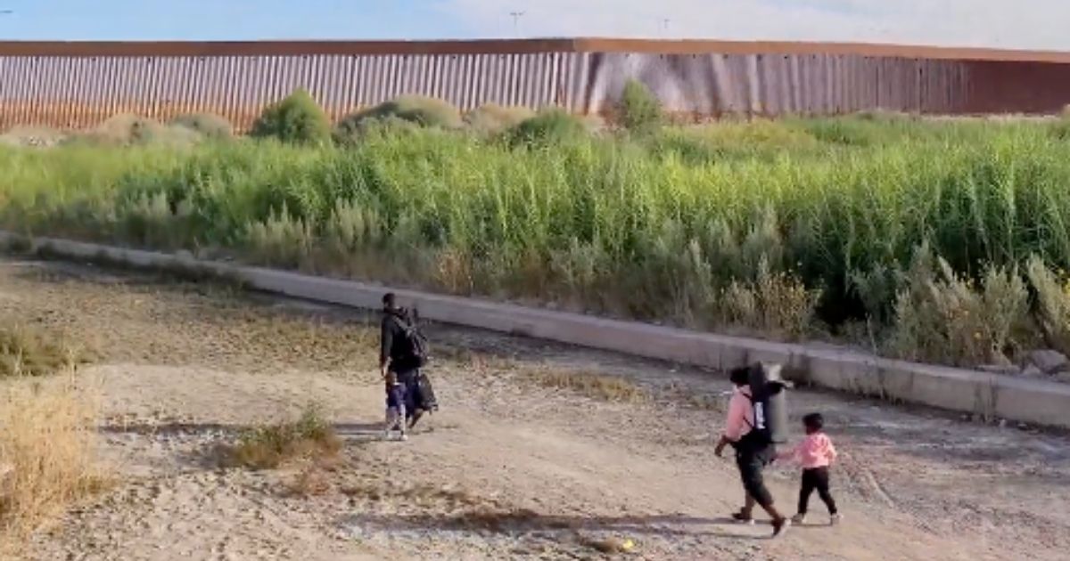 Haitian migrants illegally cross the U.S. border near Yuma, Arizona.