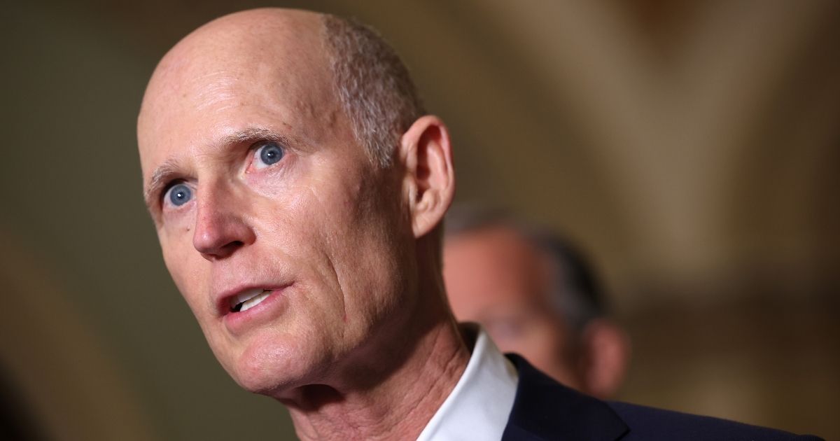 Florida Republican Sen. Rick Scott speaks to reporters after a Republican Senate luncheon at the U.S. Capitol in Washington on June 15.