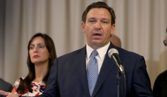 Florida Gov. Ron DeSantis speaks during an event to give out bonuses to first responders held at the Grand Beach Hotel Surfside on Aug. 10, in Surfside, Florida.