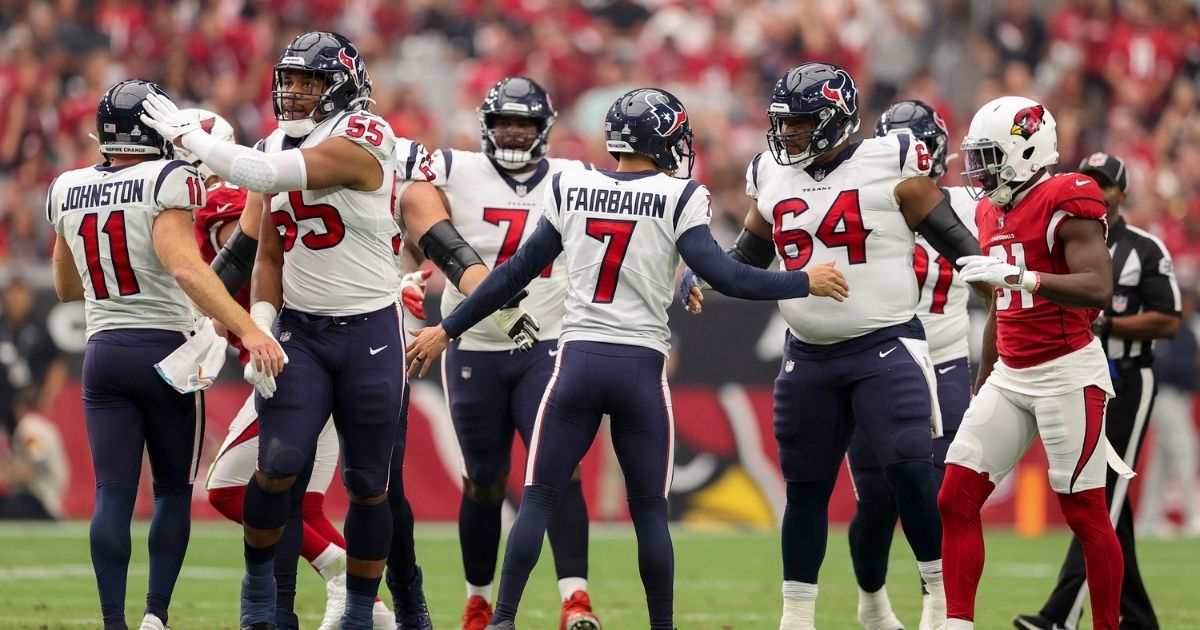 Ka'imi Fairbairn, #7 of the Houston Texans, celebrates with teammates after kicking a field goal in the second quarter against the Arizona Cardinals in the game at State Farm Stadium on Sunday in Glendale, Arizona.