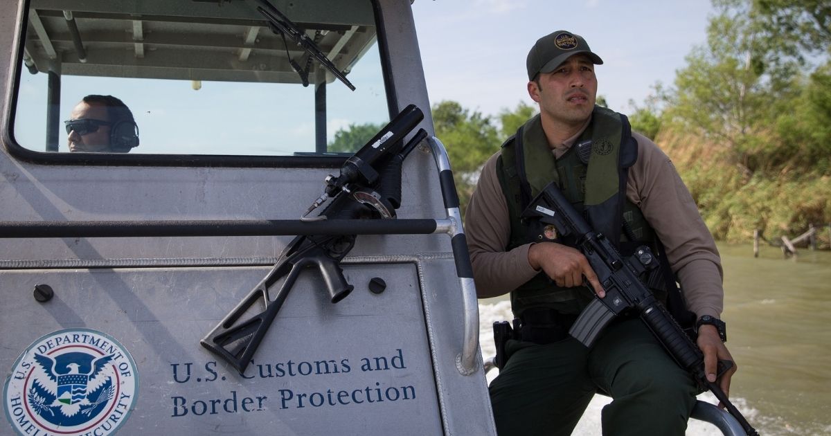 A Border Patrol Riverine Unit patrols the Rio Grande River on the border between Mexico and the United States on Monday, March 26, 2018, near McAllen, Texas.