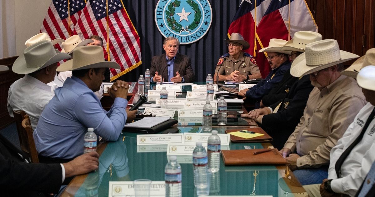 Texas Gov. Greg Abbott meets with sheriffs from border counties in July in Austin.