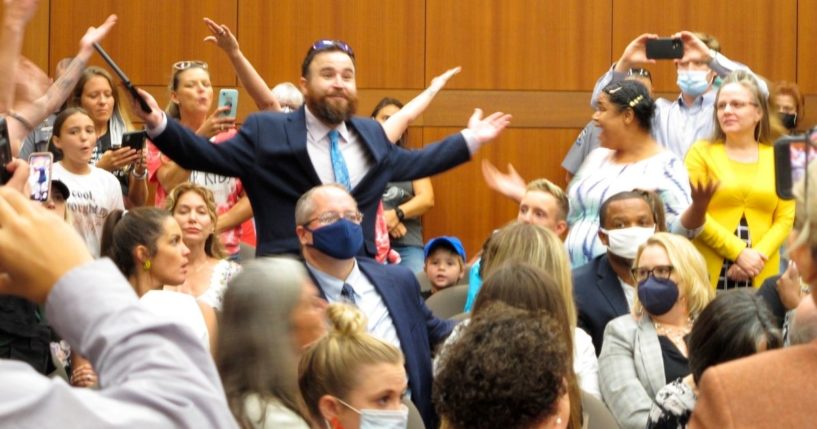 A crowd turns out at a meeting of the Louisiana Board of Elementary and Secondary Education in August in Baton Rouge to protest mask mandates that affect public schools.