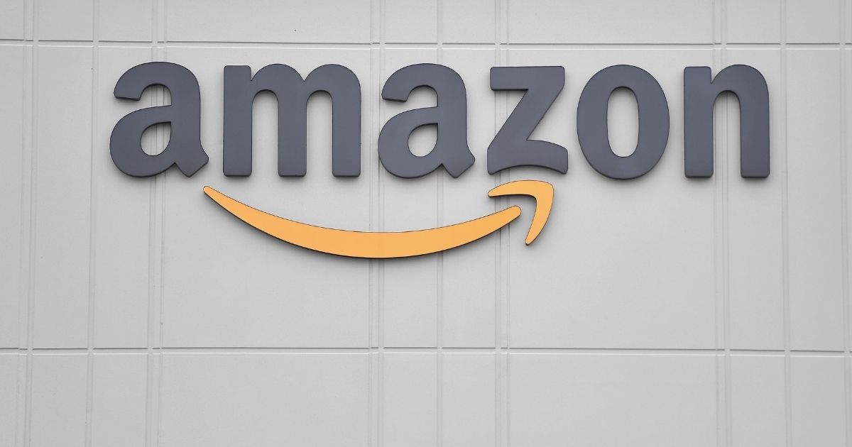 The Amazon logo is seen at a Staten Island distribution center on March 30, 2020, in New York.