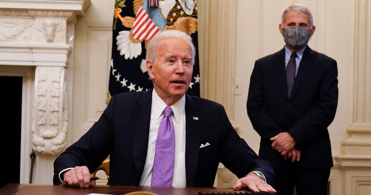 President Joe Biden is pictured in a Jan. 21 file photo in the Oval Office with Dr. Anthony Fauci, director of the National Institute of Allergy and Infectious Diseases.
