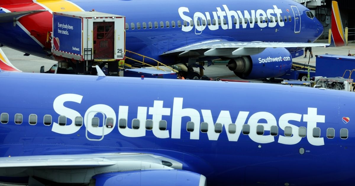 Southwest airplanes sit at a gate at Baltimore Washington International Thurgood Marshall Airport in Baltimore, on Oct. 11.