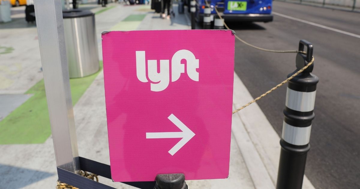 A Lyft sign sits at a rideshare lot at Los Angeles International Airport (LAX) in Los Angeles on Aug. 20, 2020.
