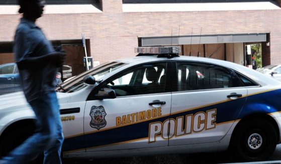 A Baltimore, Maryland, police car is seen in this file photo from July 28, 2019. The Baltimore state’s attorney’s office is struggling to prosecute a massive backlog of felony cases due to a 24 percent decline in its number of federal prosecutors over the last three years.